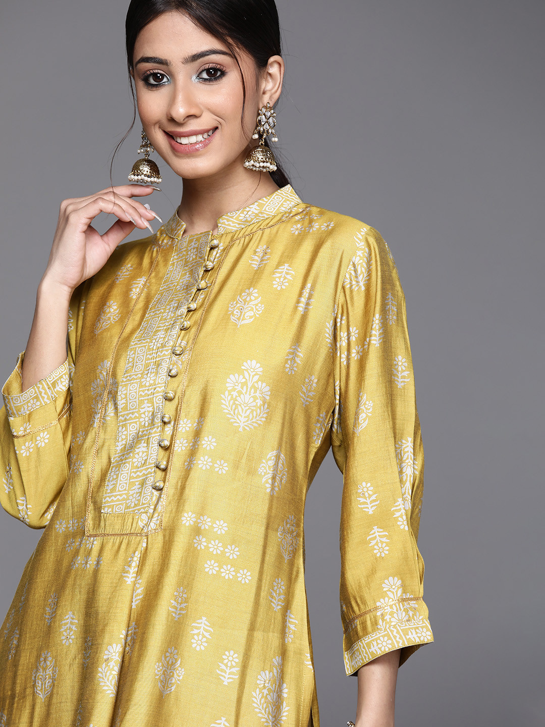 

Libas Women Mustard Yellow & White Ethnic Motifs Printed Gotta Patti Chanderi Silk Kurta