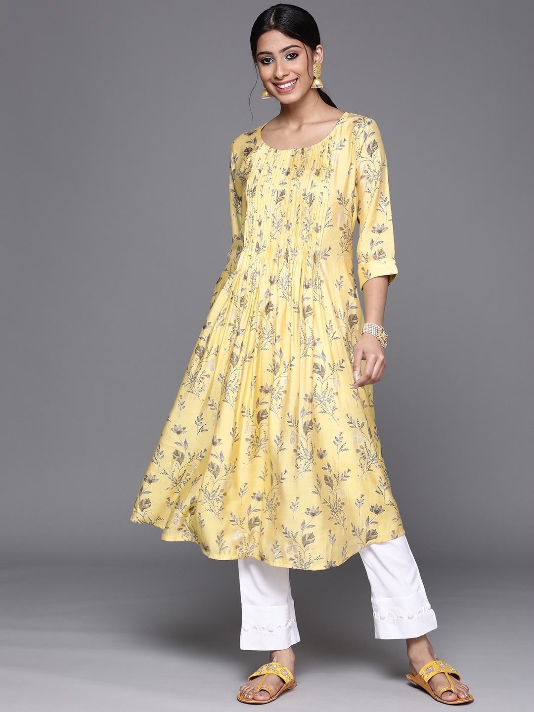 

Libas Women Yellow Floral Printed Chanderi Silk Kurta