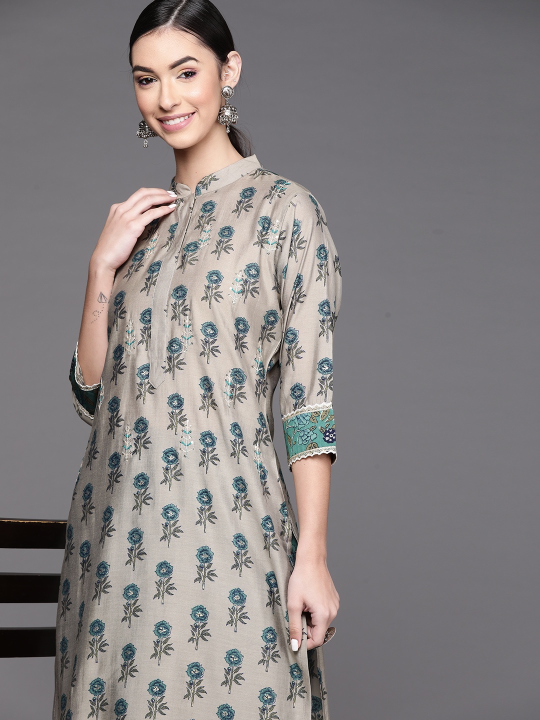 

Libas Women Grey & Blue Floral Print Mandarin Collar Thread Work Chanderi Silk Kurta