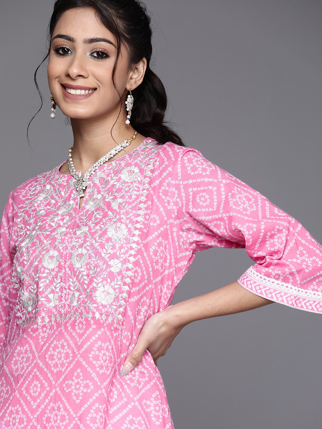 

Libas Women Pink Bandhani Yoke Design Flared Sleeves Kurta