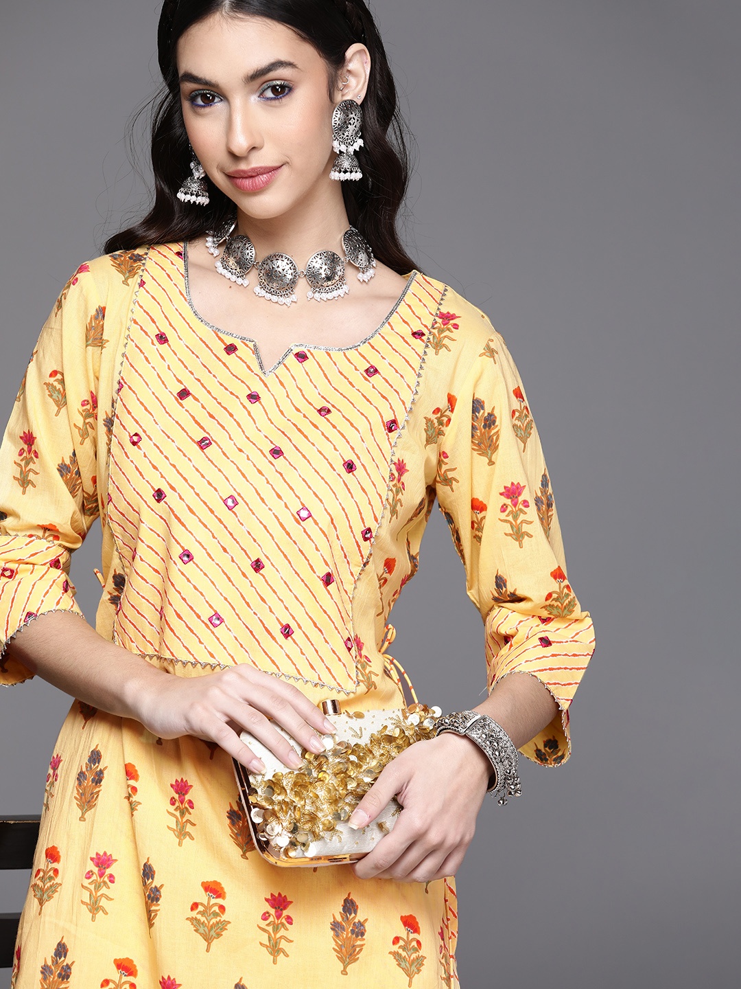 

Libas Women Yellow Floral Printed Gotta Patti Cotton Kurta