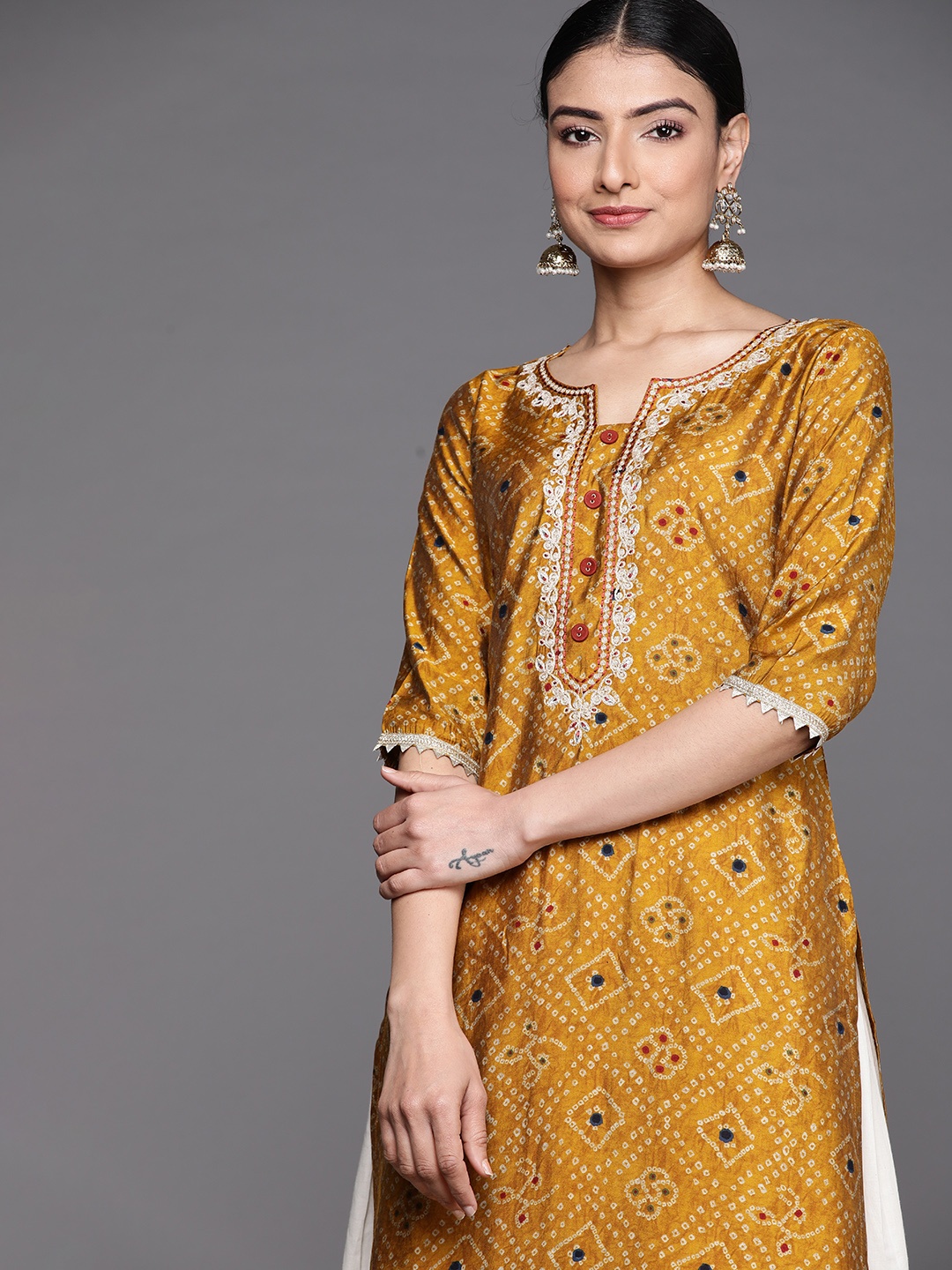 

Libas Women Mustard Yellow Bandhani Print Thread Work Indie Prints Chanderi Silk Kurta
