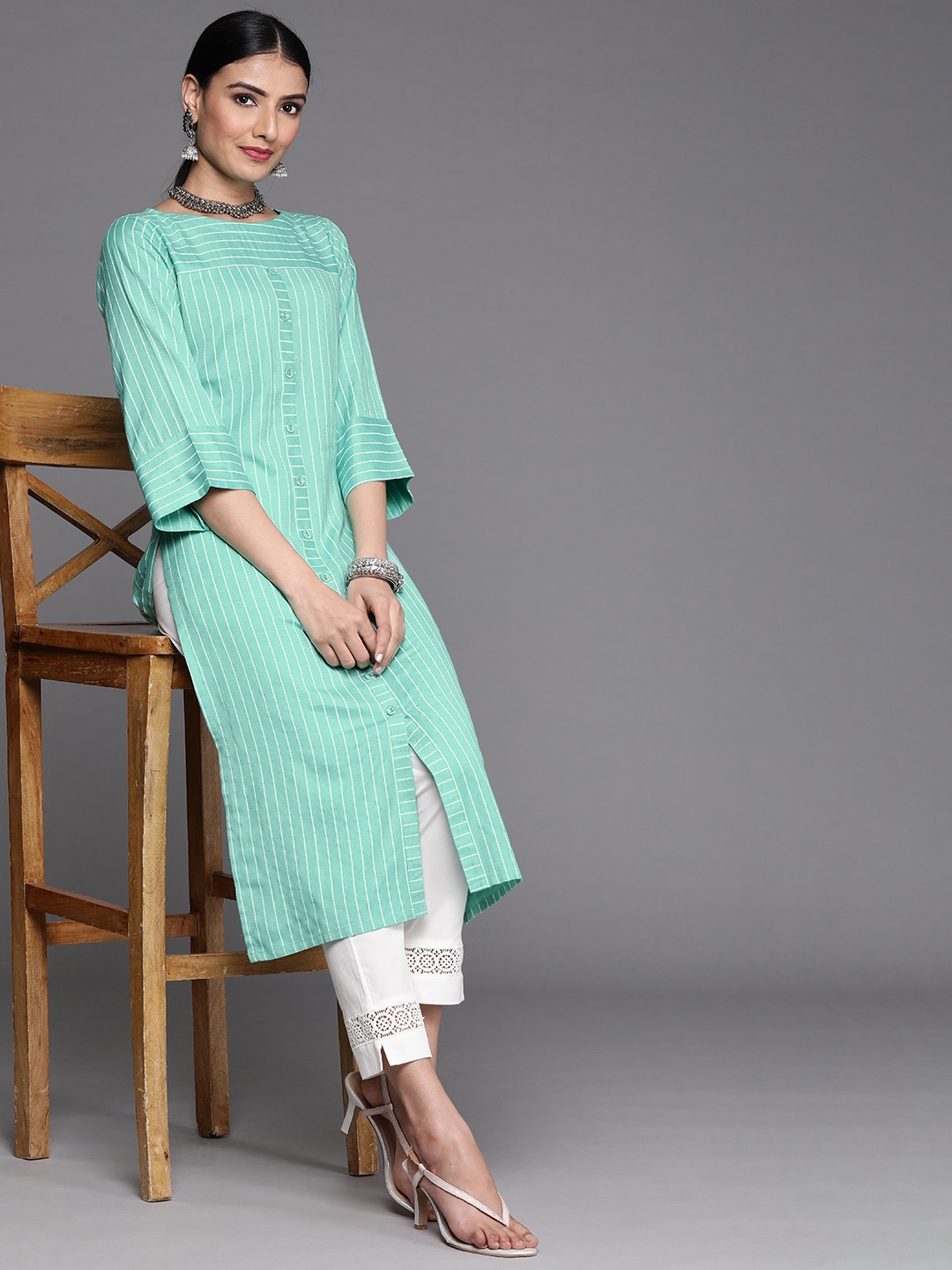 

Libas Women Sea Green Striped Flared Sleeves Kurta