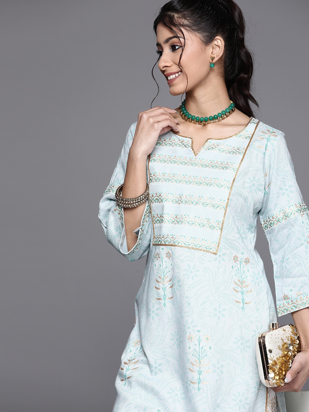 

Libas Women Blue Floral Yoke Design Flared Sleeves Gotta Patti Floral Kurta