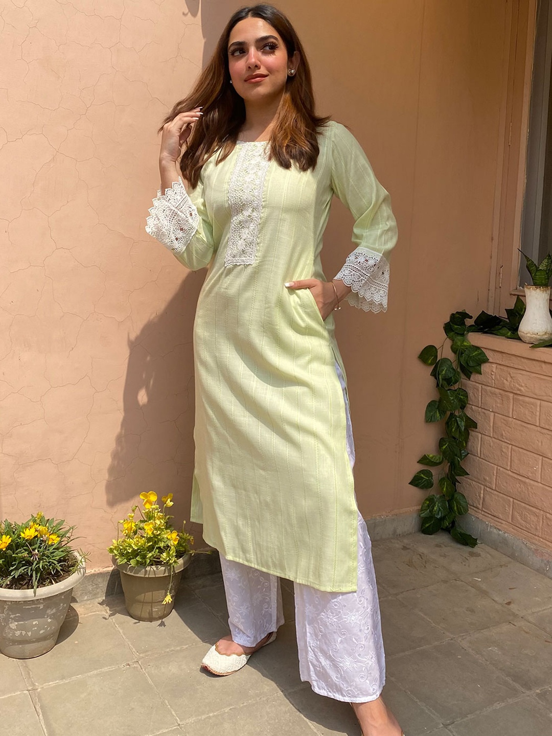 

Libas Women Green Woven Design Flared Sleeves Lace Inserts Rayon Pastels Straight Kurta