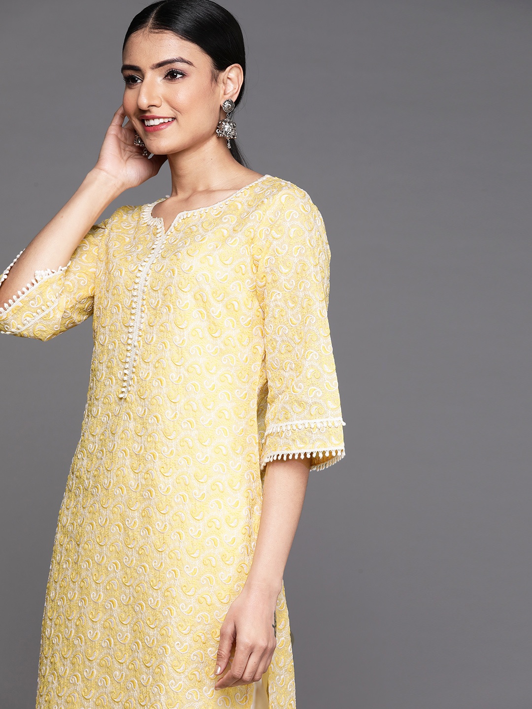 

Libas Women Yellow Paisley Embroidered Chikankari Cotton Kurta