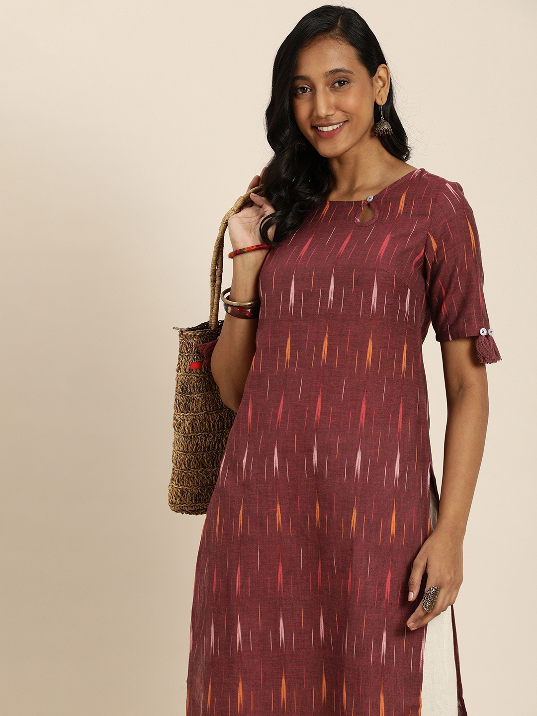 

Taavi Women Maroon Ikat Woven Design Kurta