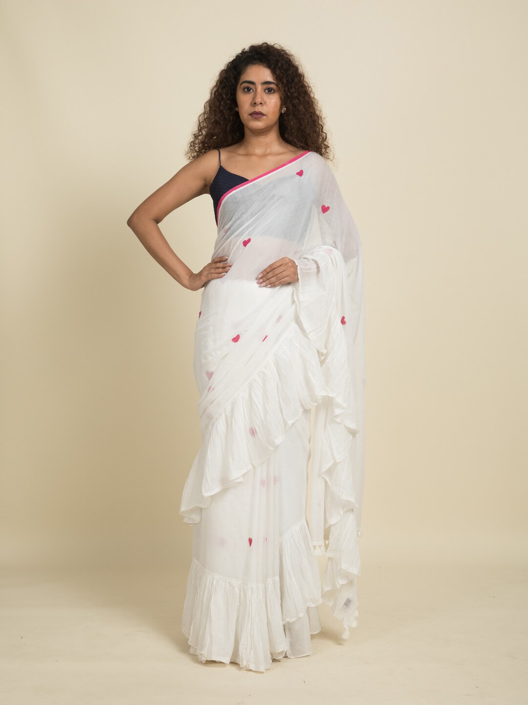 

Suta White & Magenta Pure Cotton Ruffle Saree