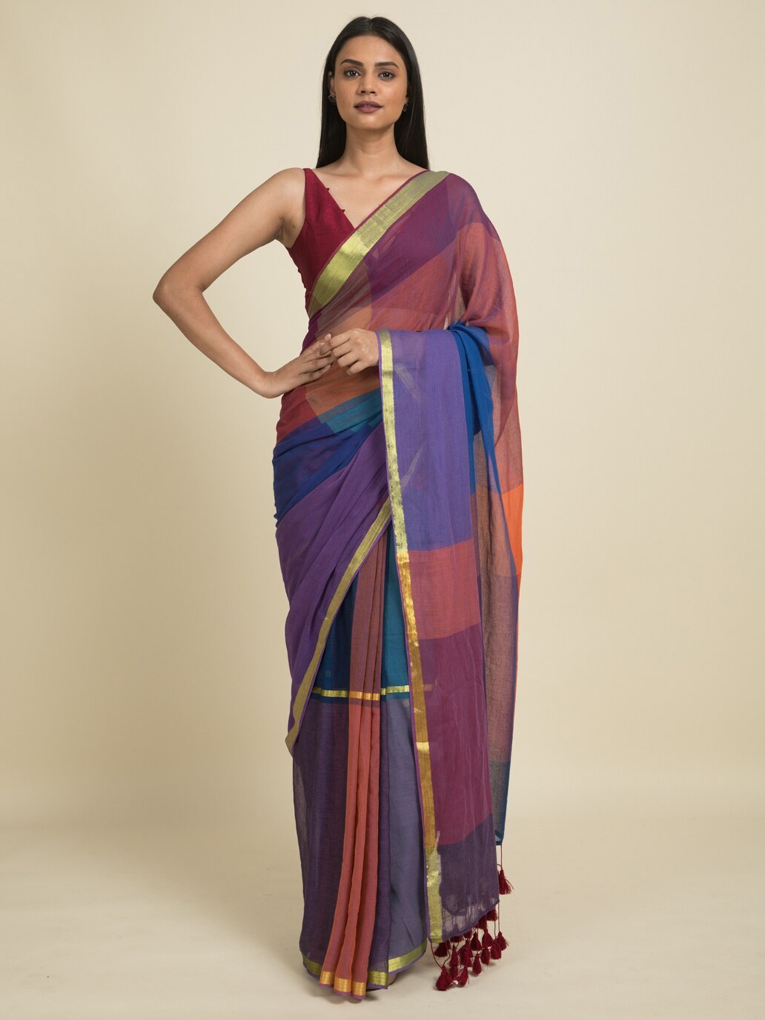 

Suta Blue & Purple Colourblocked Zari Saree