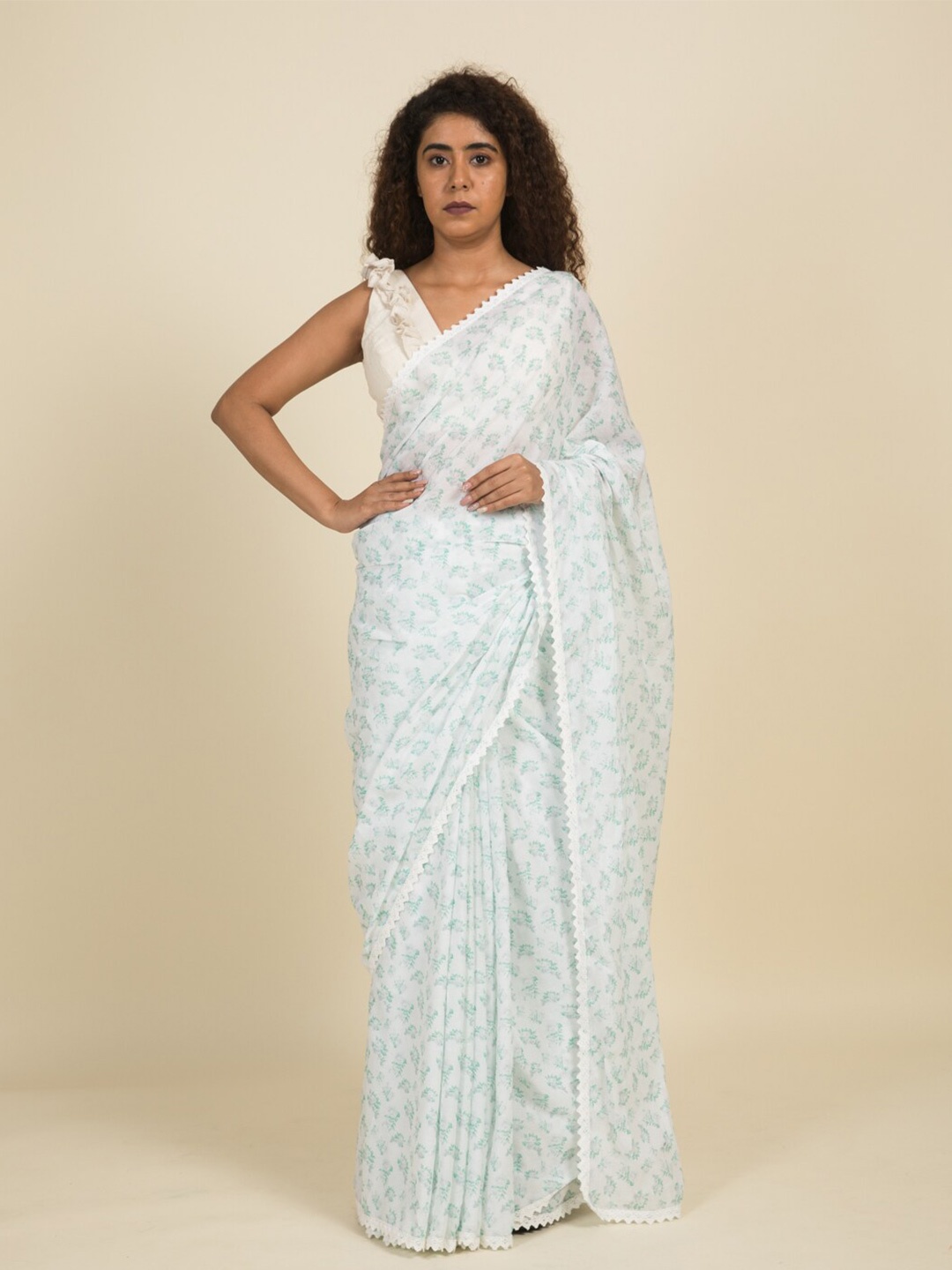 

Suta White & Green Floral Pure Cotton Saree
