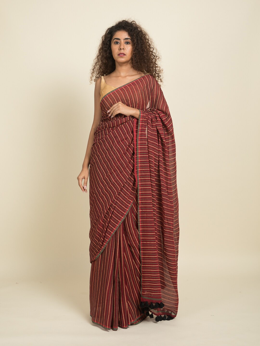 

Suta Brown & Grey Striped Pure Cotton Saree