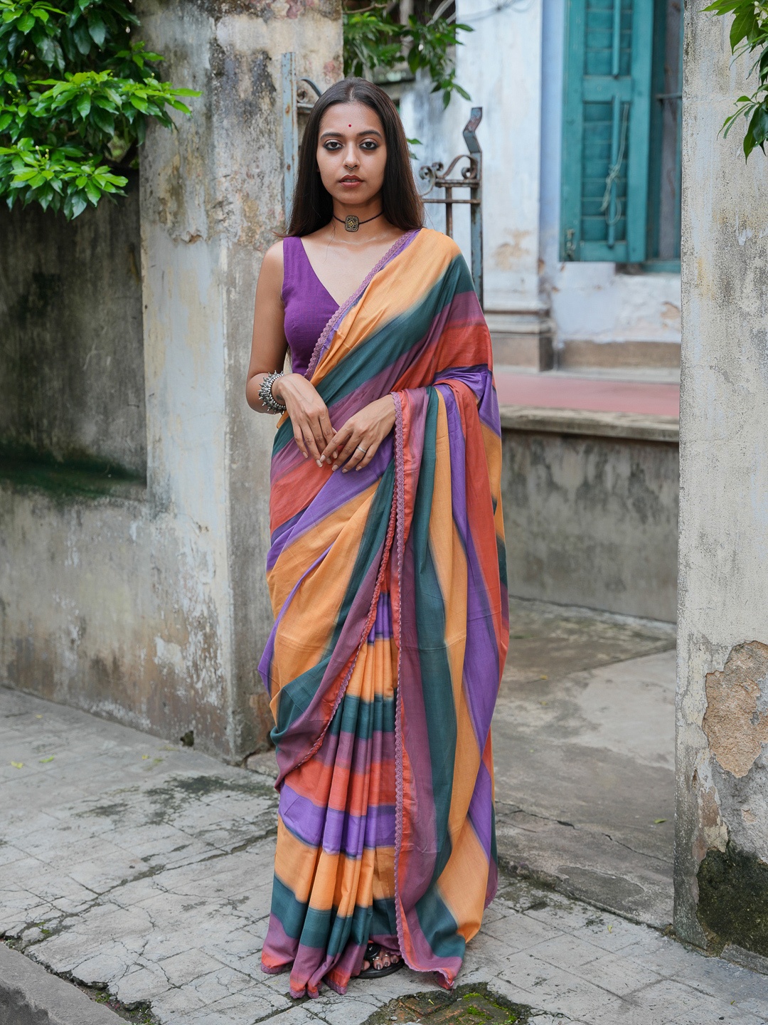 

Suta Red & Violet Striped Pure Cotton Saree