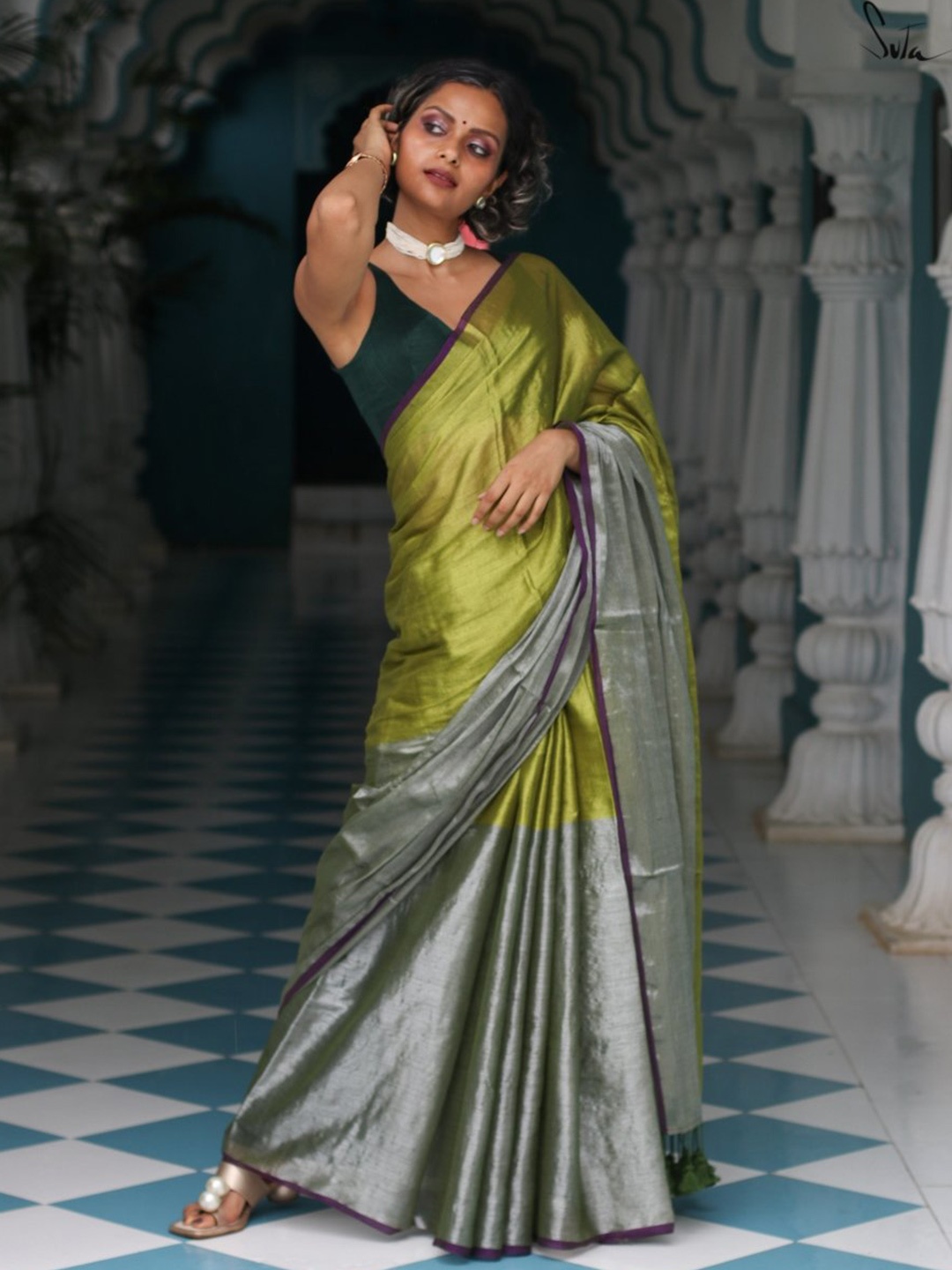 

Suta Green & Silver-Toned Zari Saree