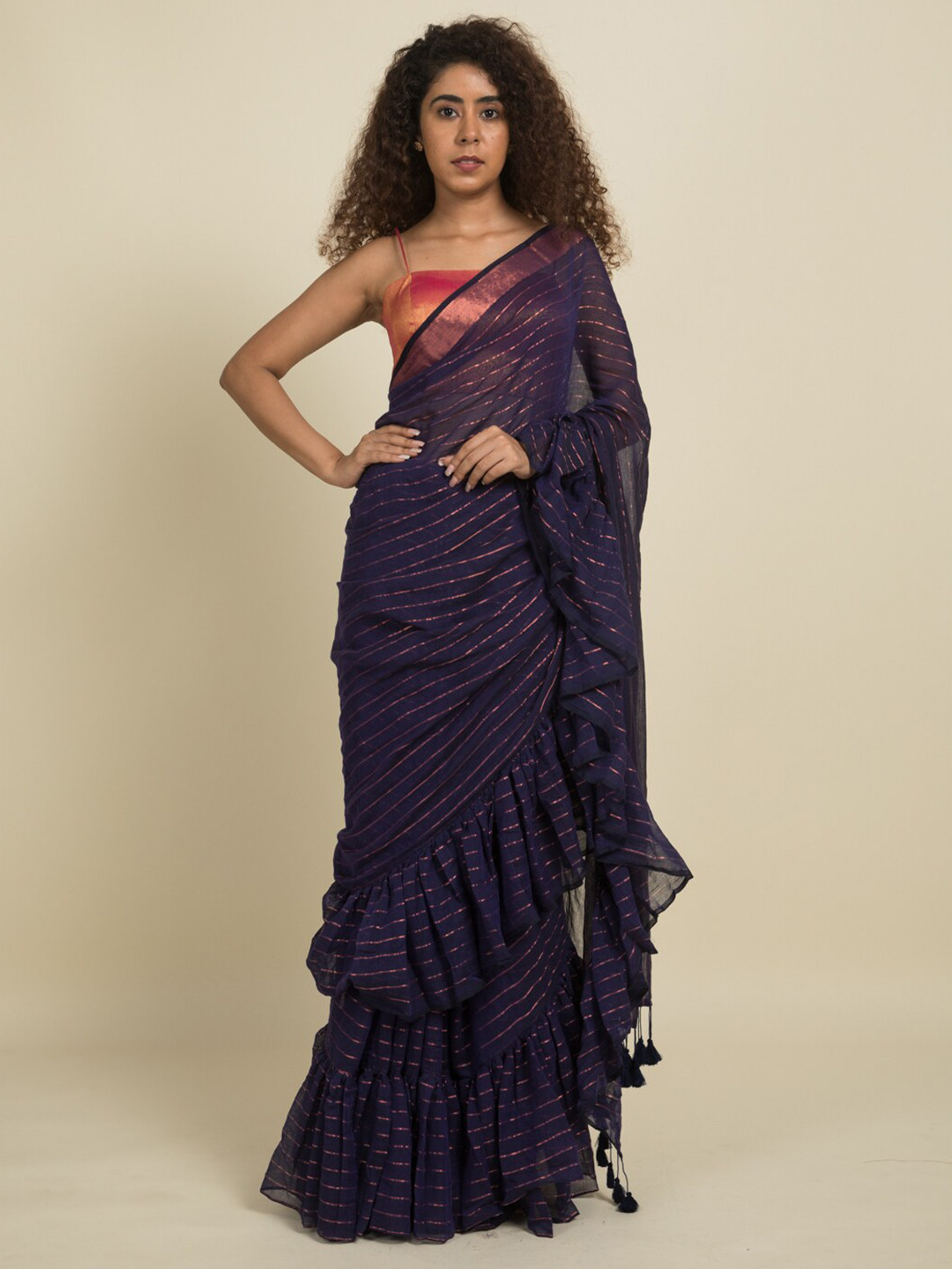 

Suta Blue & Copper Striped Zari Ruffle Saree