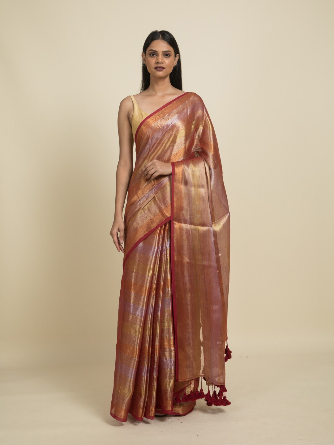 

Suta Maroon & Gold-Toned Striped Saree