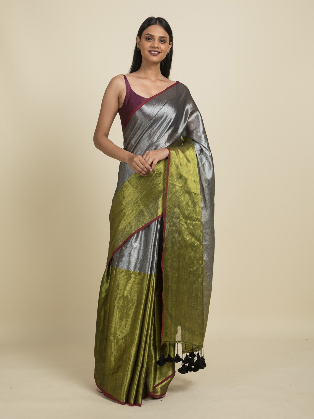 

Suta Black & Green Zari Saree