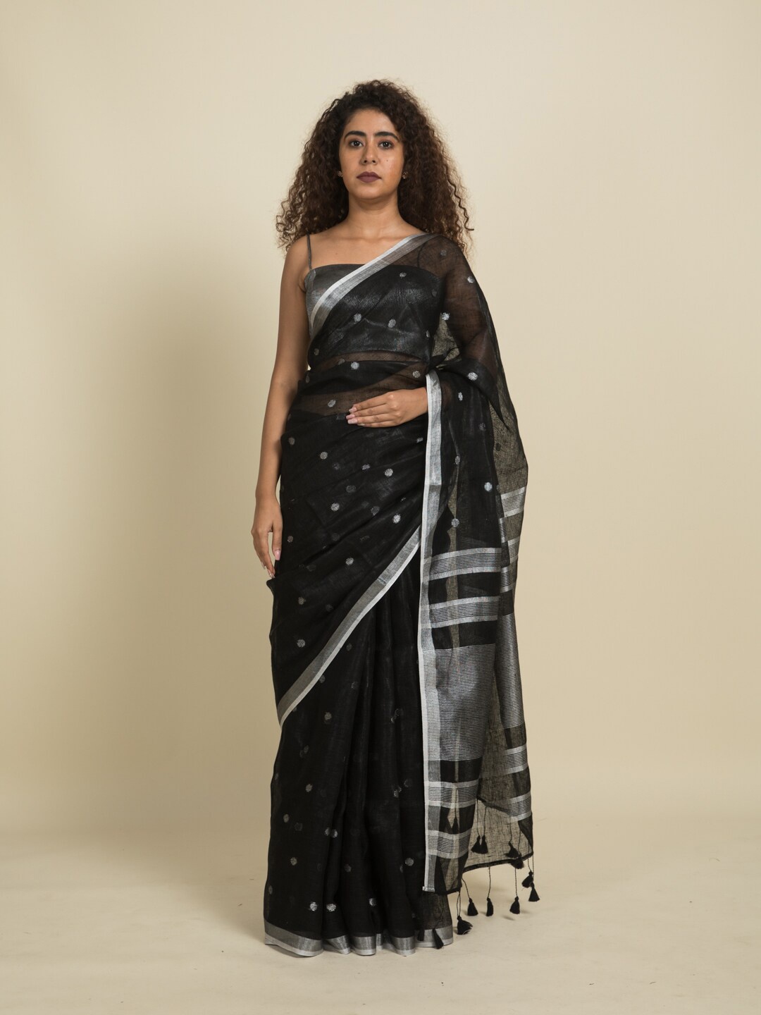 

Suta Black & Silver-Toned Zari Linen Blend Saree