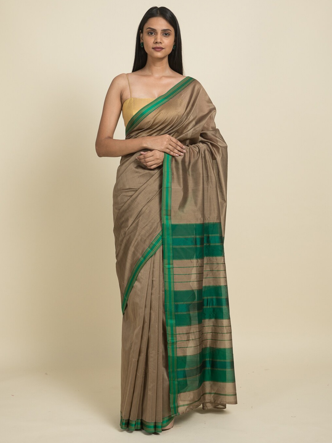 

Suta Brown & Green Zari Silk Cotton Maheshwari Saree