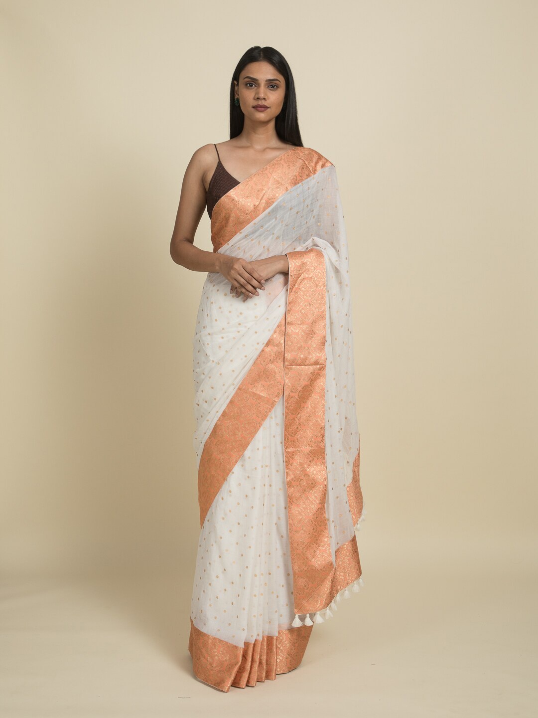 

Suta White & Orange Pure Cotton Saree