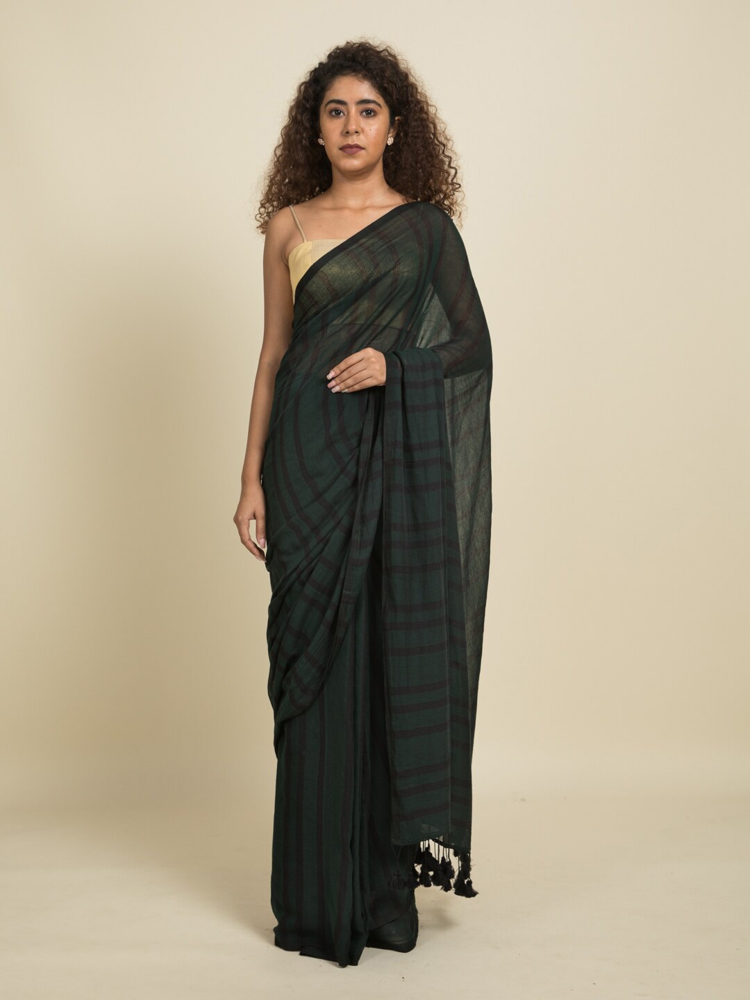 

Suta Green Striped Pure Cotton Saree
