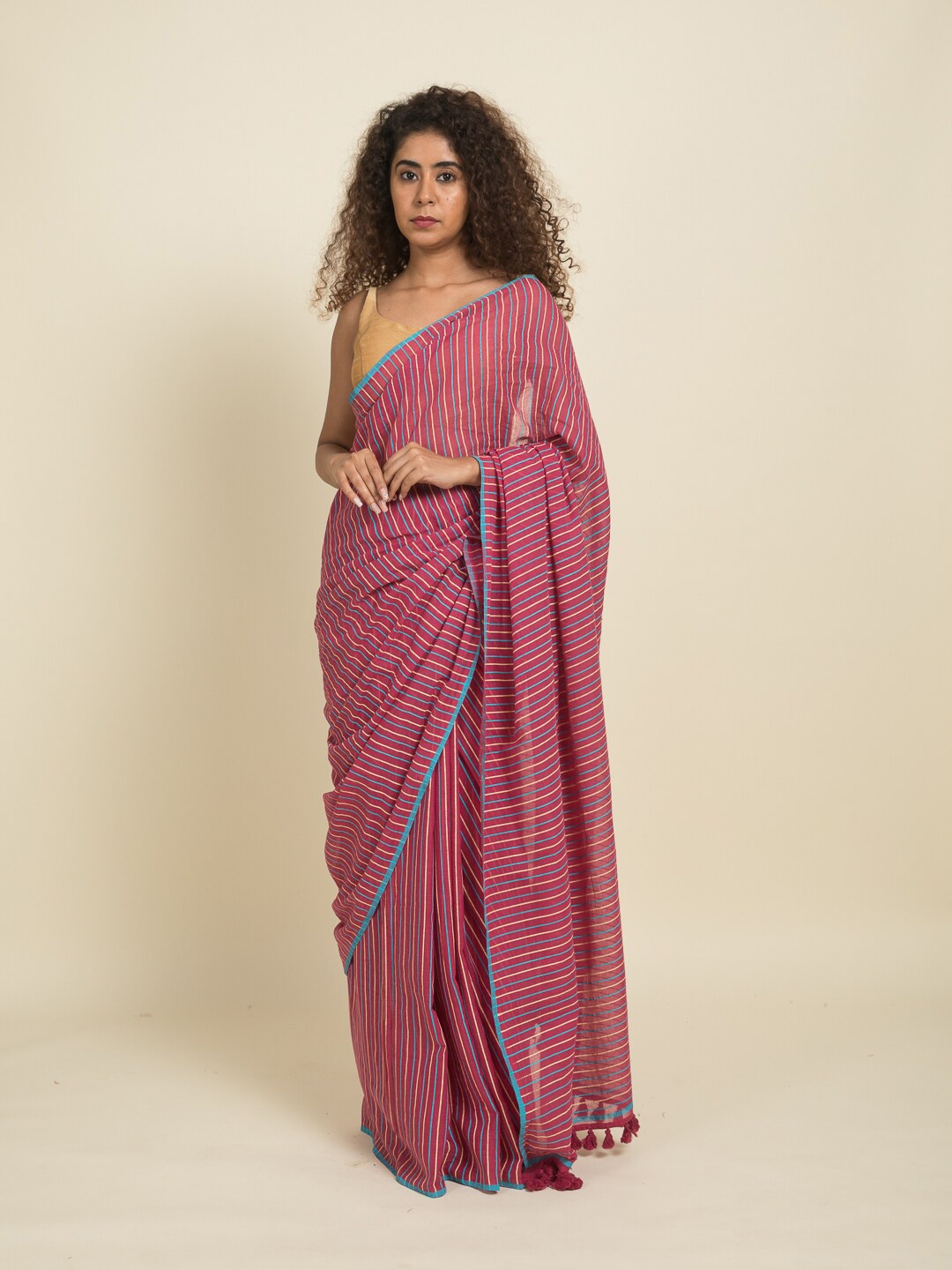 

Suta Pink & Blue Striped Pure Cotton Saree