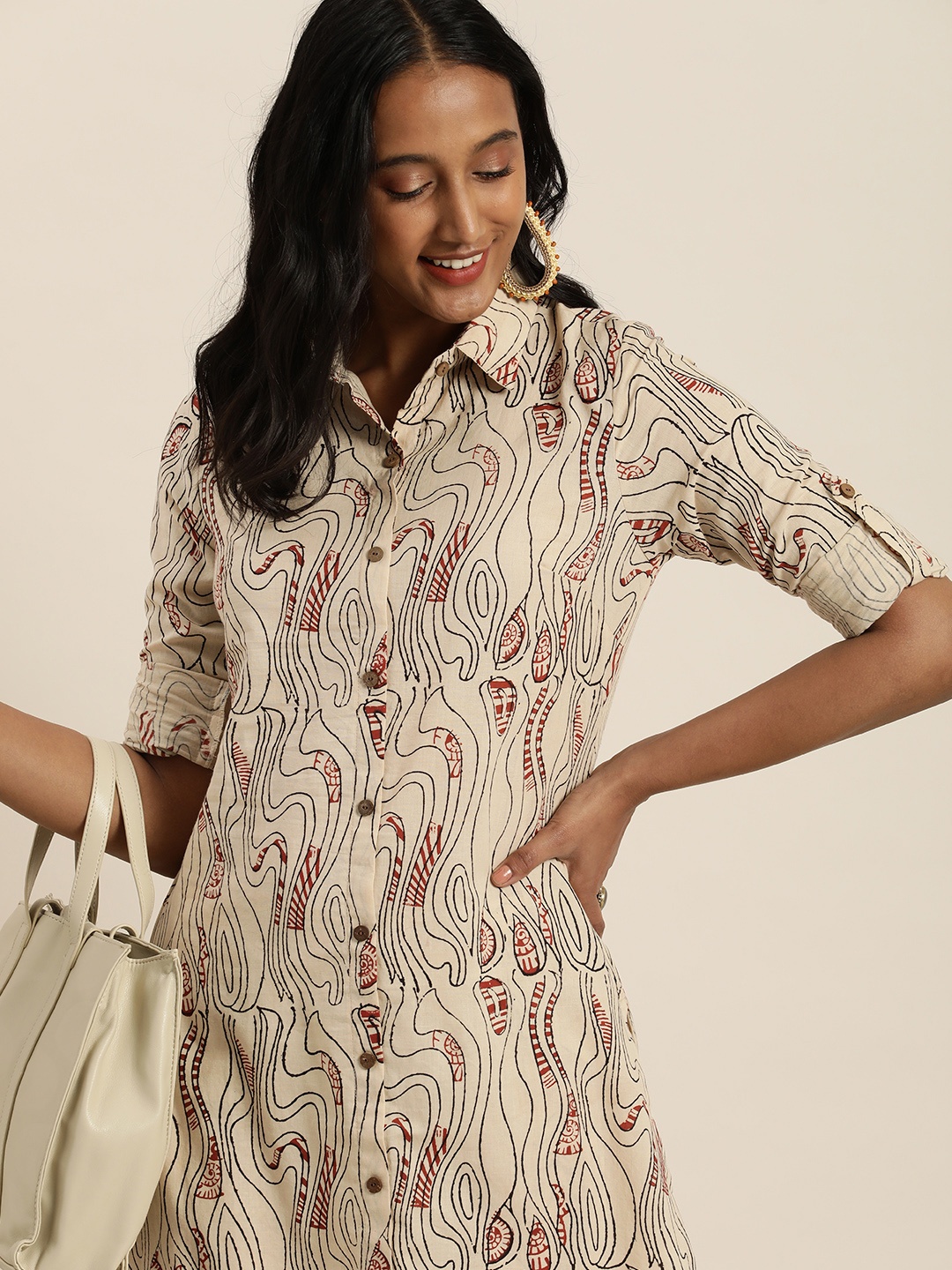 

Taavi Women Beige And Black Bagru Printed Pure Cotton Kurta with Trousers