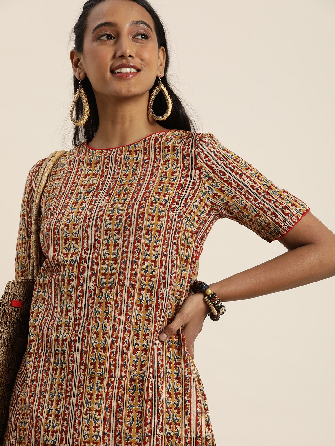 Taavi Women Red & Blue Kalamkari Hand Block Print Kurta with Boat Neck