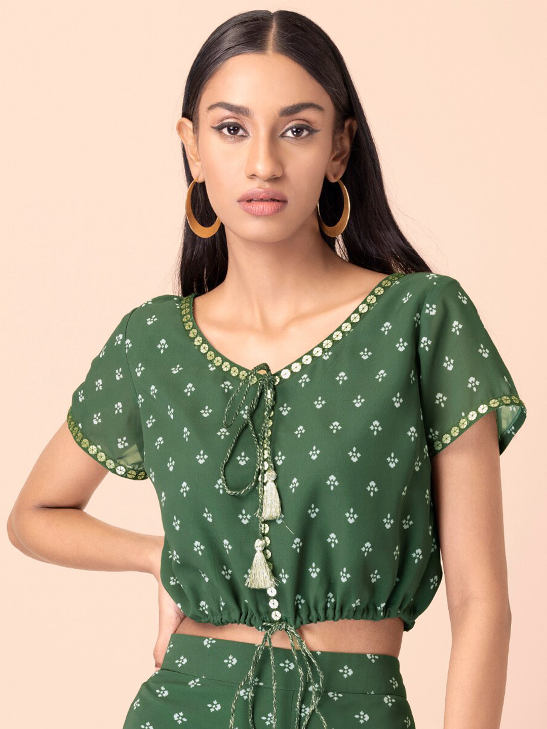 

INDYA Green Printed Tie-Up Neck Georgette Blouson Crop Top