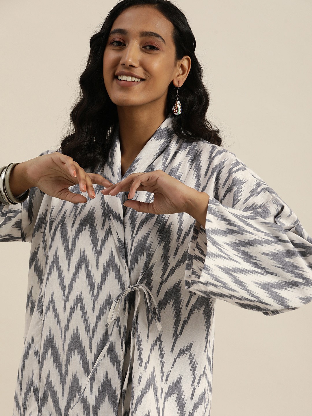 

Taavi Grey & White Ikat Printed Extended Sleeves Wrap Top