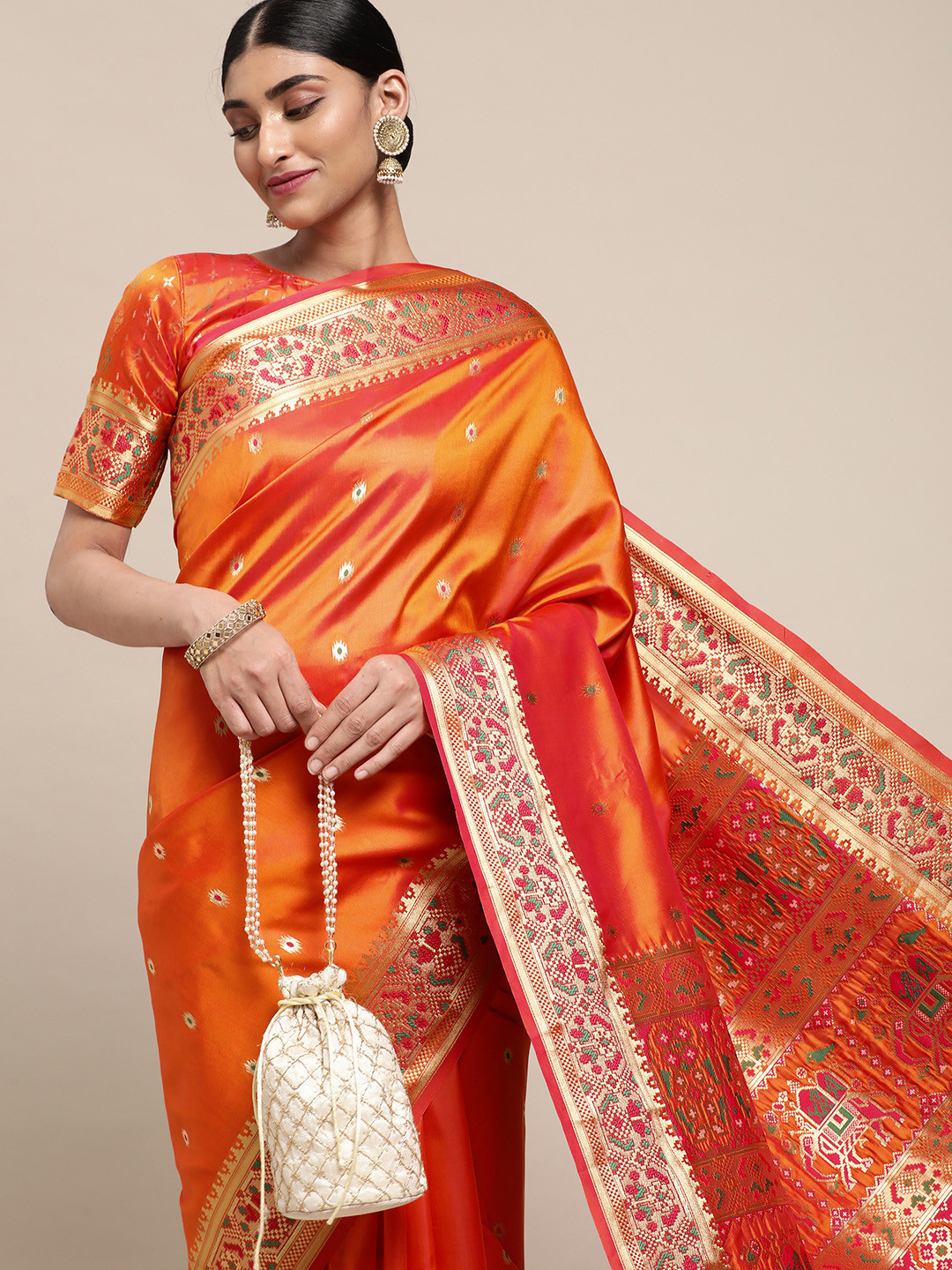 

Satrani Orange & Gold-Toned Ethnic Motifs Woven Design Silk Cotton Banarasi Saree
