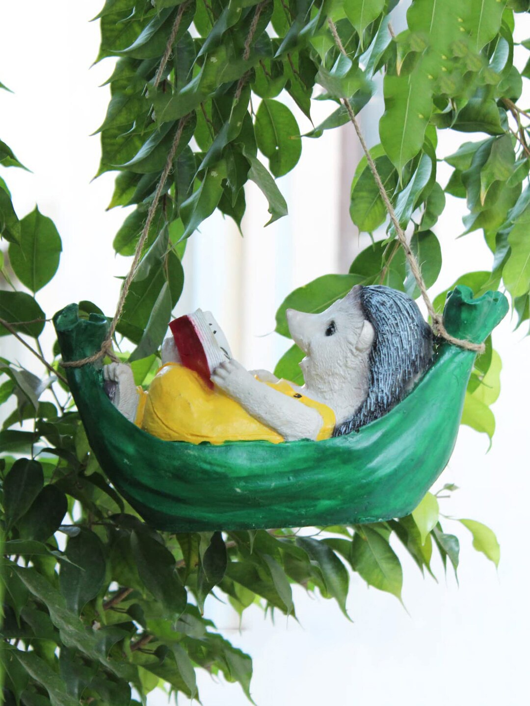 

Wonderland Green & Yellow Hanging Garden Decor Hedgehog on Hammock