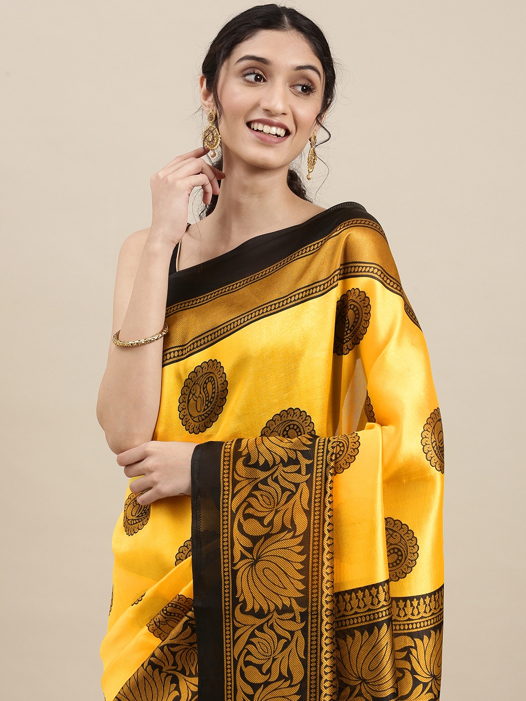 

KALINI Yellow & Black Ethnic Motifs Saree