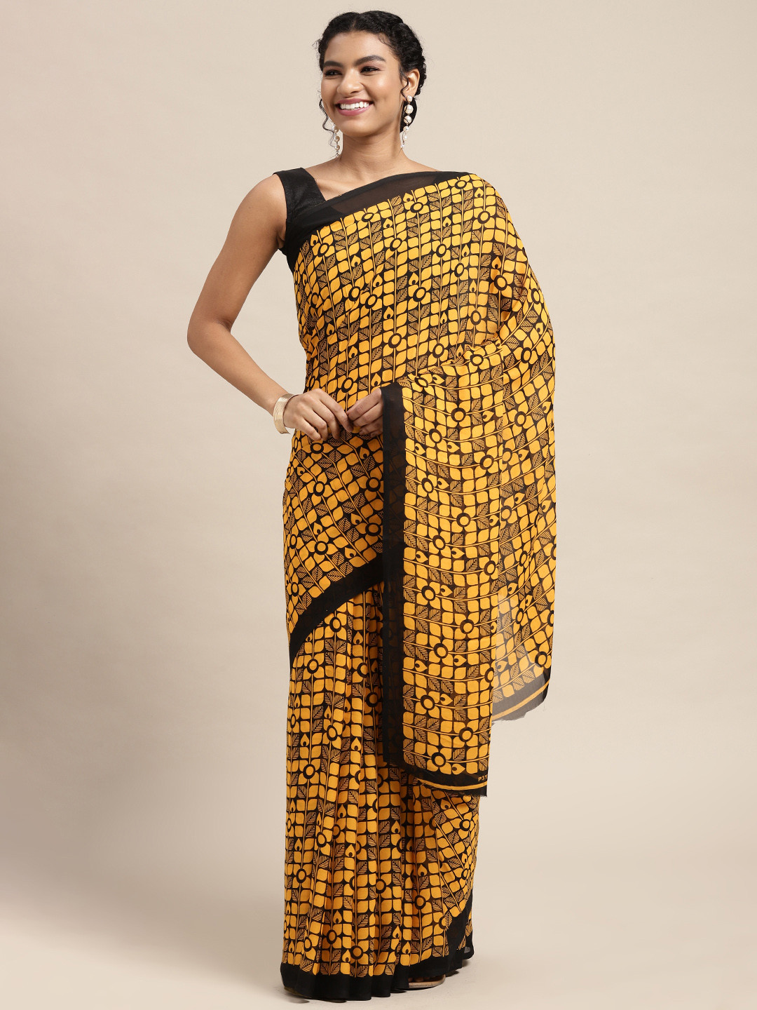 

KALINI Mustard & Black Ethnic Motifs Saree