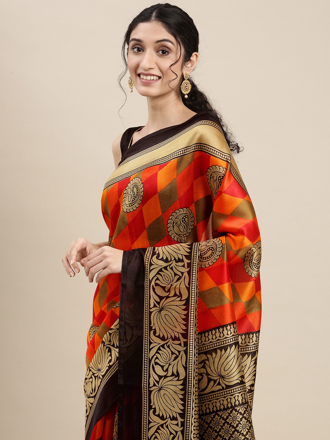 

KALINI Women Orange & Black Ethnic Motifs Saree