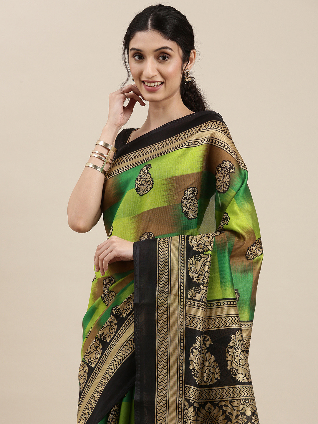 

KALINI Women Green & Black Ethnic Motifs Saree