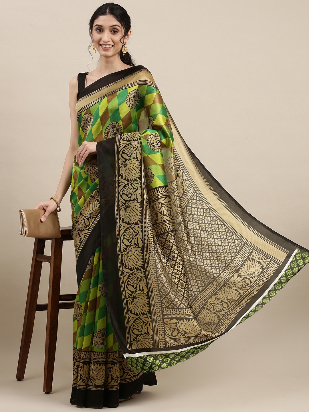 

KALINI Green & Black Ethnic Motifs Saree