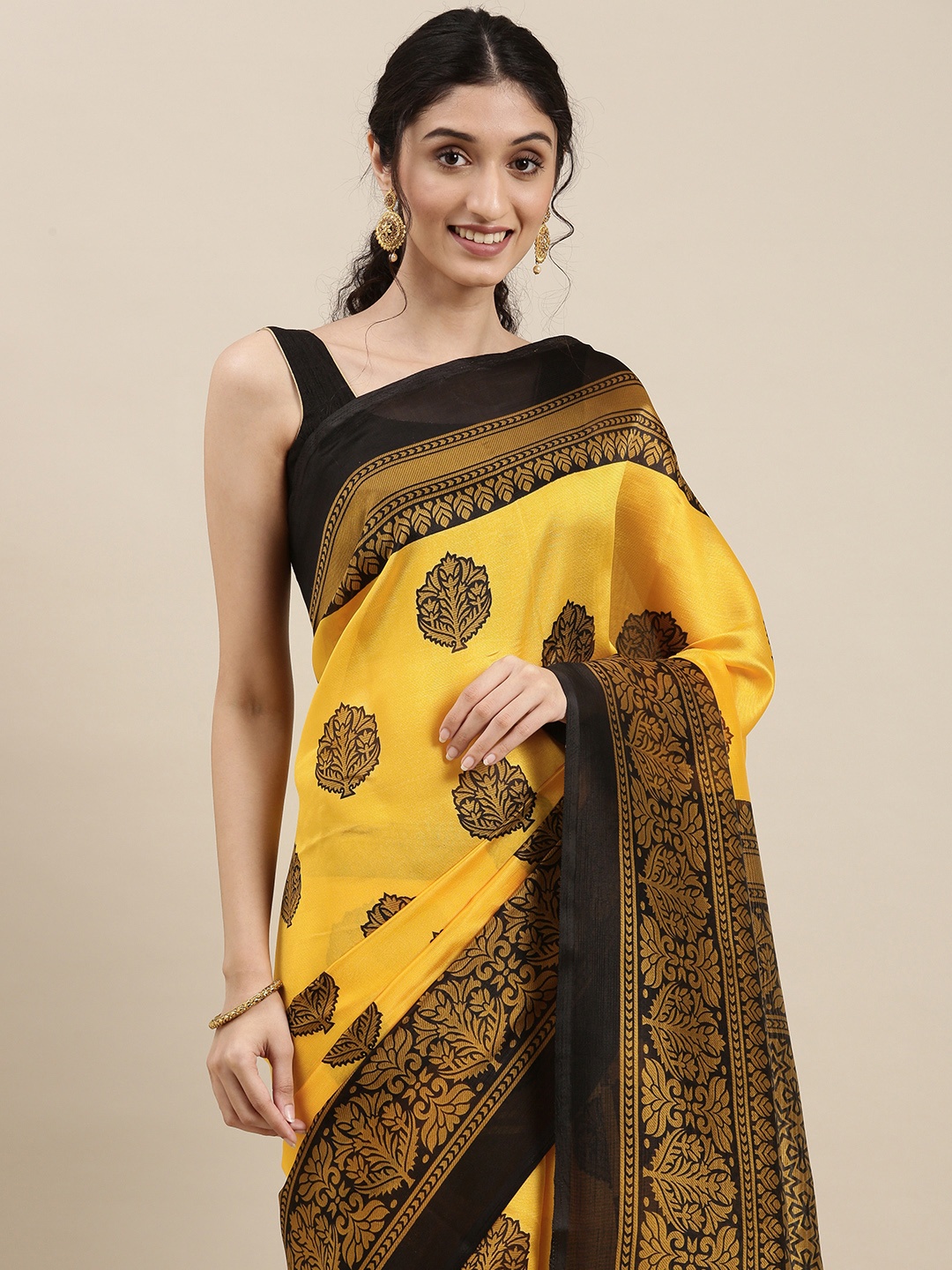 

KALINI Women Yellow & Black Ethnic Motifs Saree