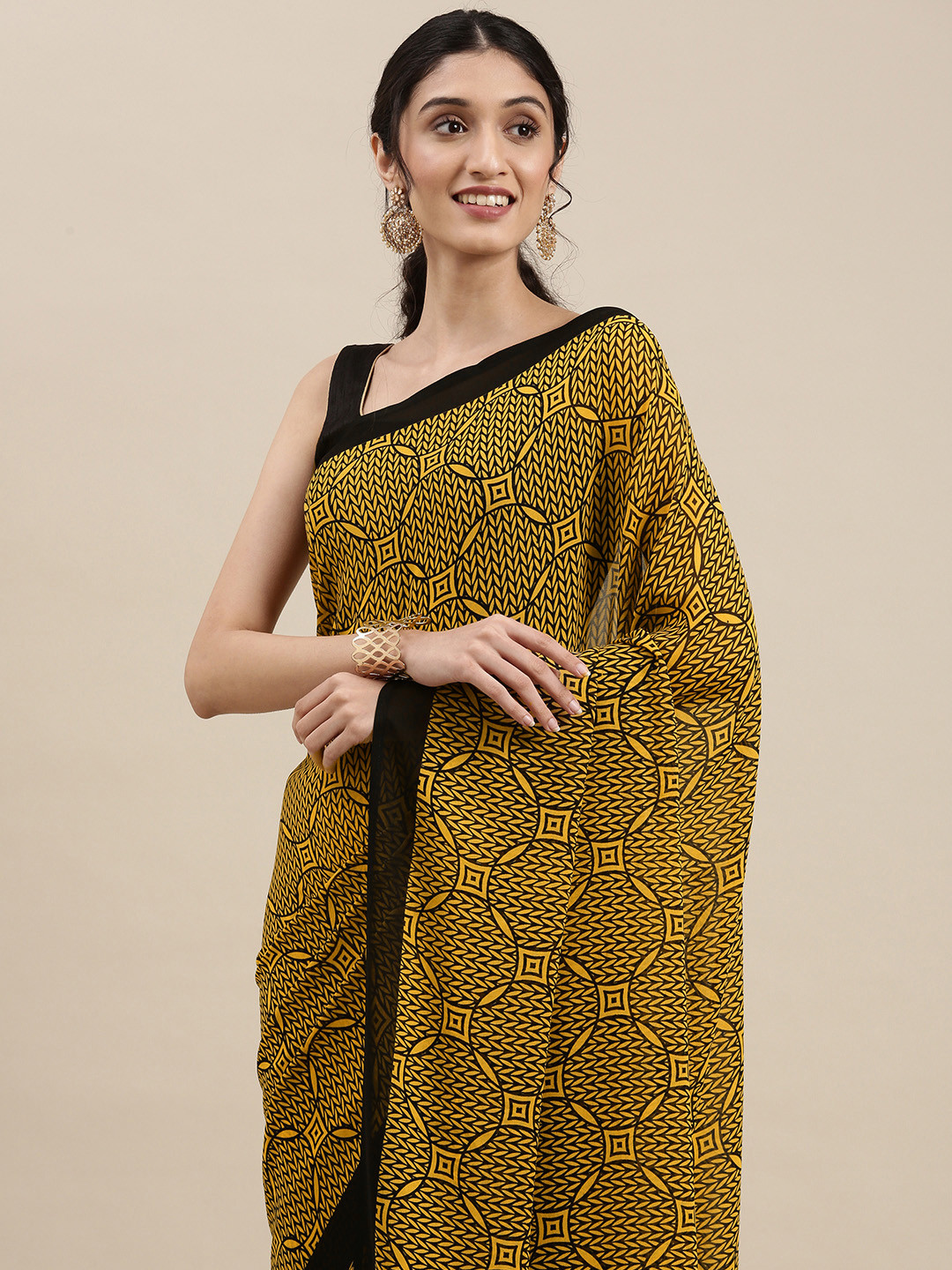 

KALINI Women Mustard Yellow & Black Printed Saree