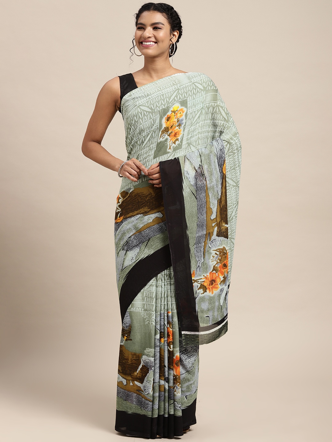 

KALINI White & Green Ethnic Motifs Saree
