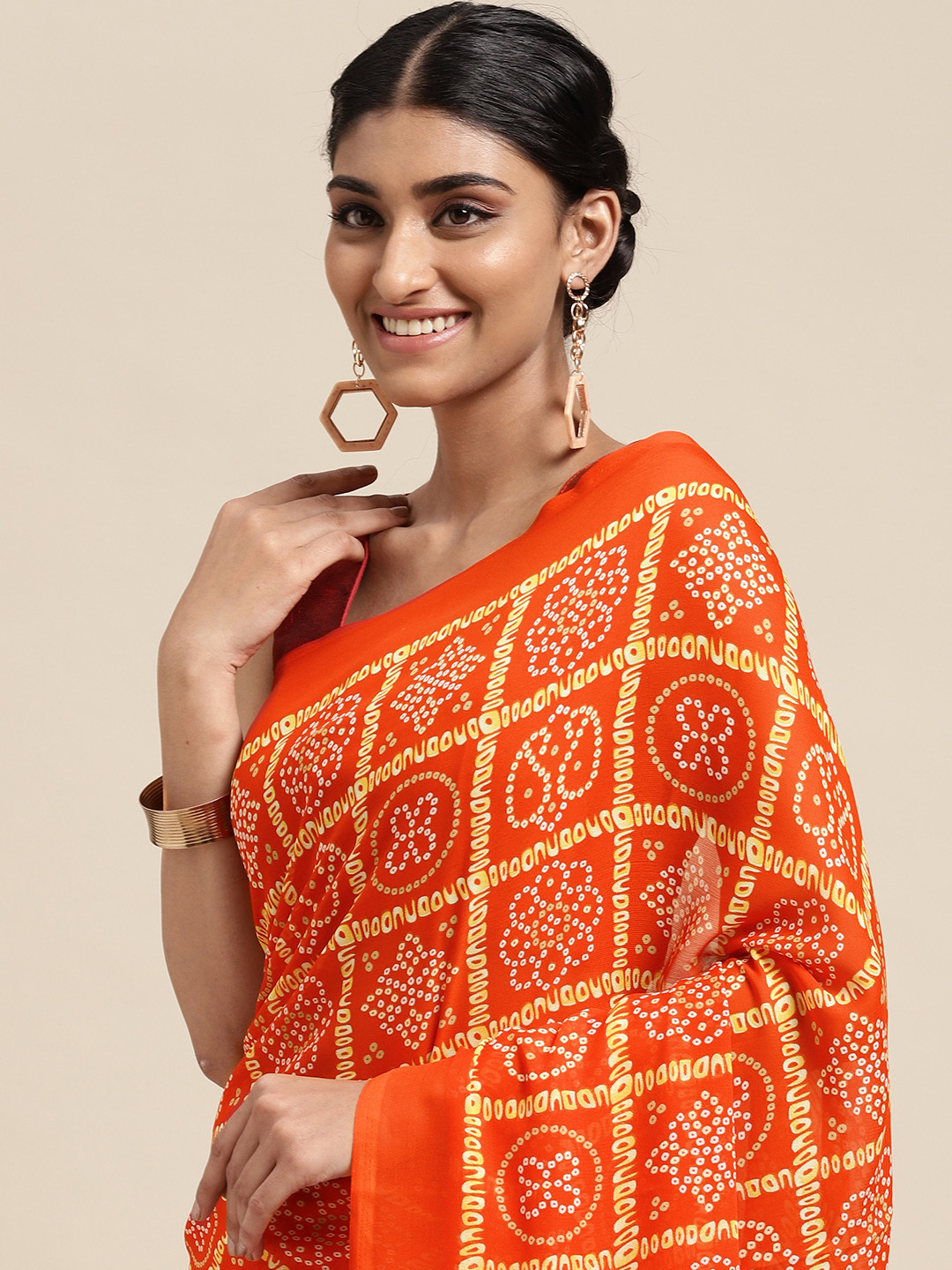 

KALINI Orange Bandhani Saree