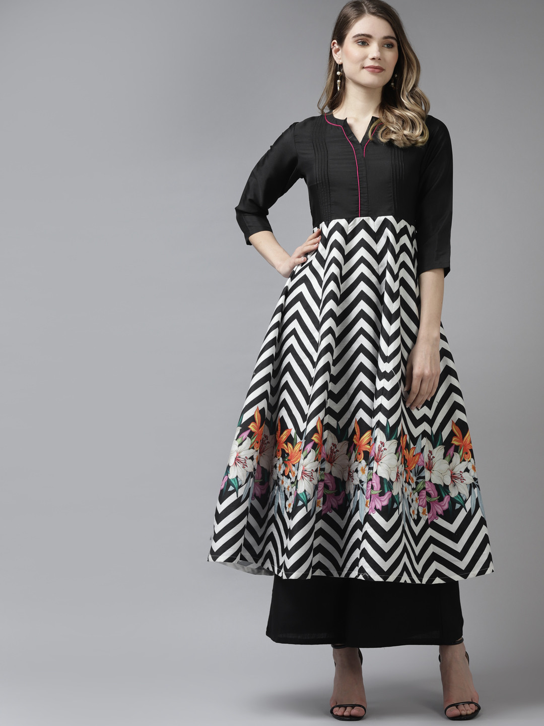 

Bhama Couture Women Black Striped Kurta with Palazzos