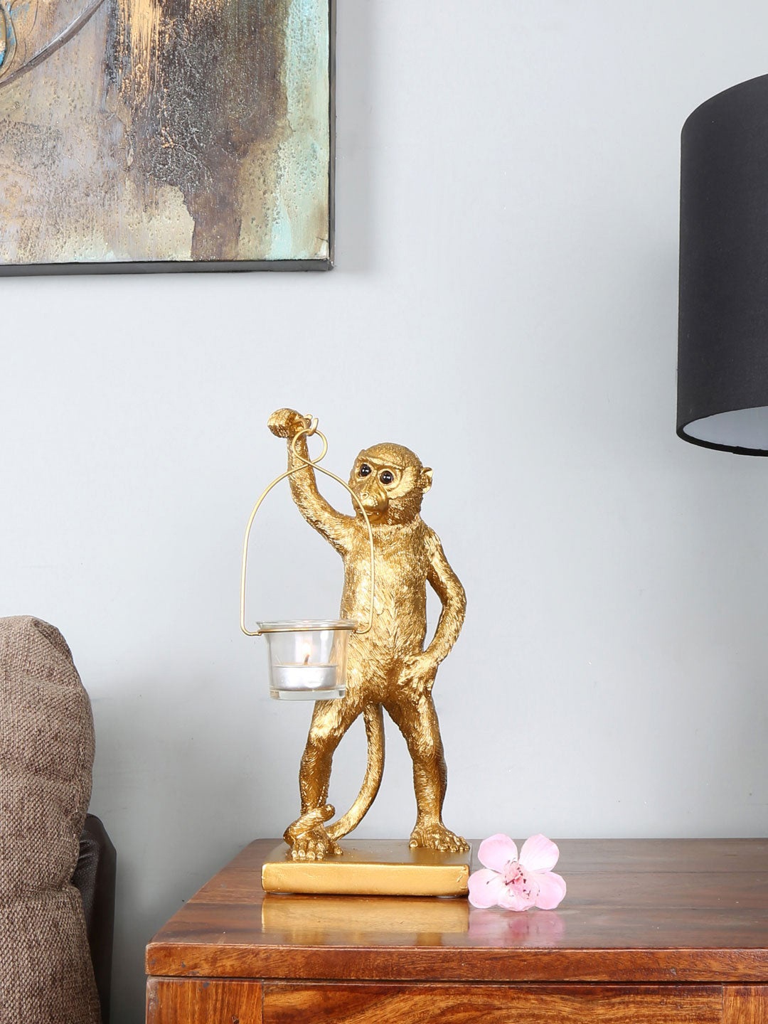 

Athome by Nilkamal Gold-Toned Monkey Holding Showpiece