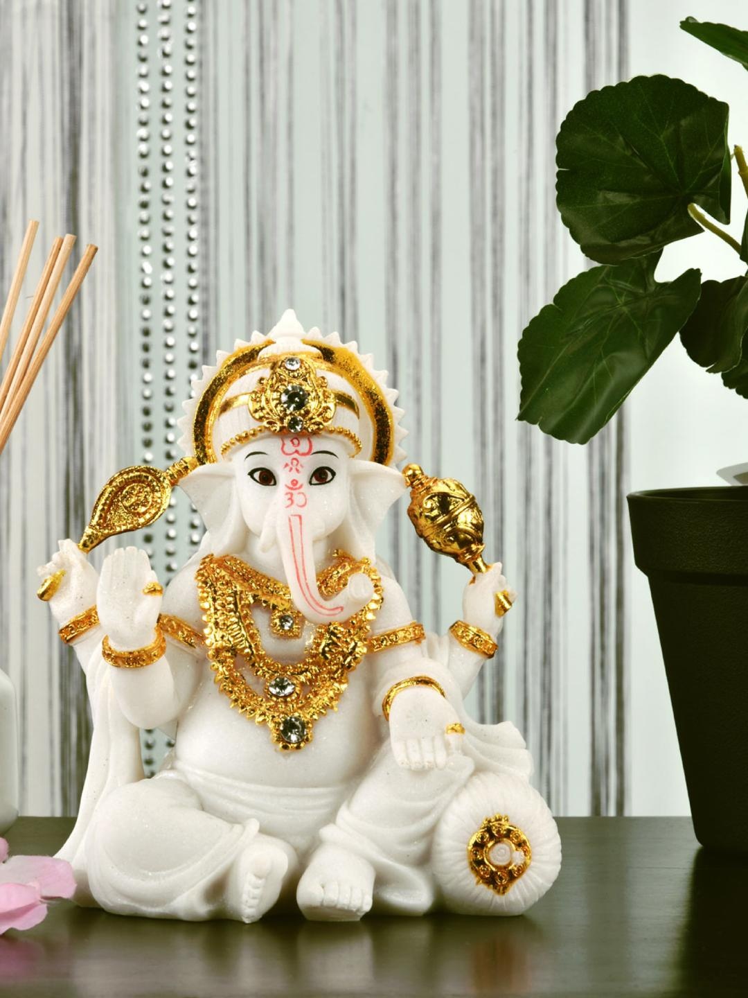 

Athome by Nilkamal White And Gold Ganesha On Cushion Showpiece