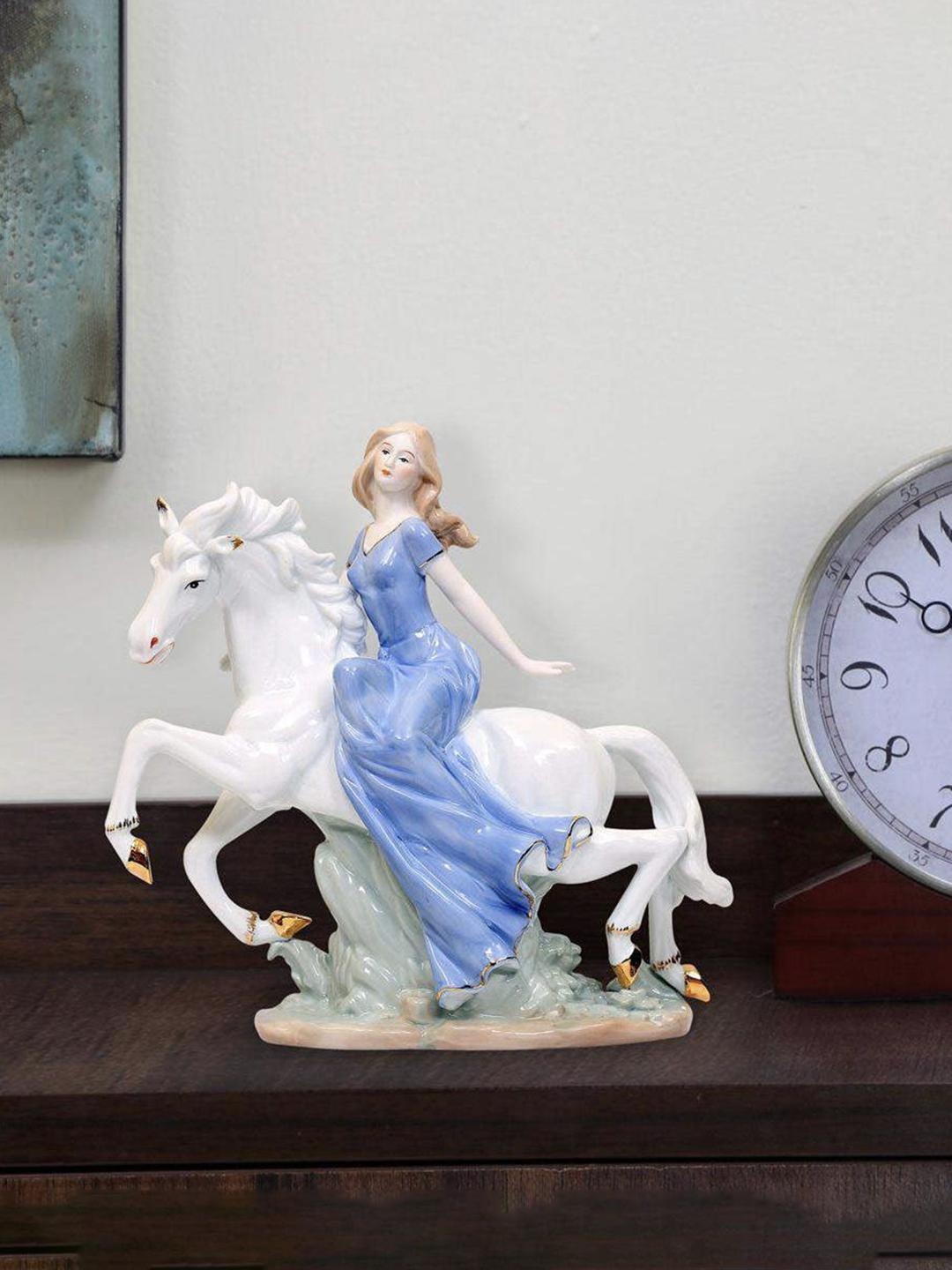 

Athome by Nilkamal Blue & White Lady On Horse Showpiece