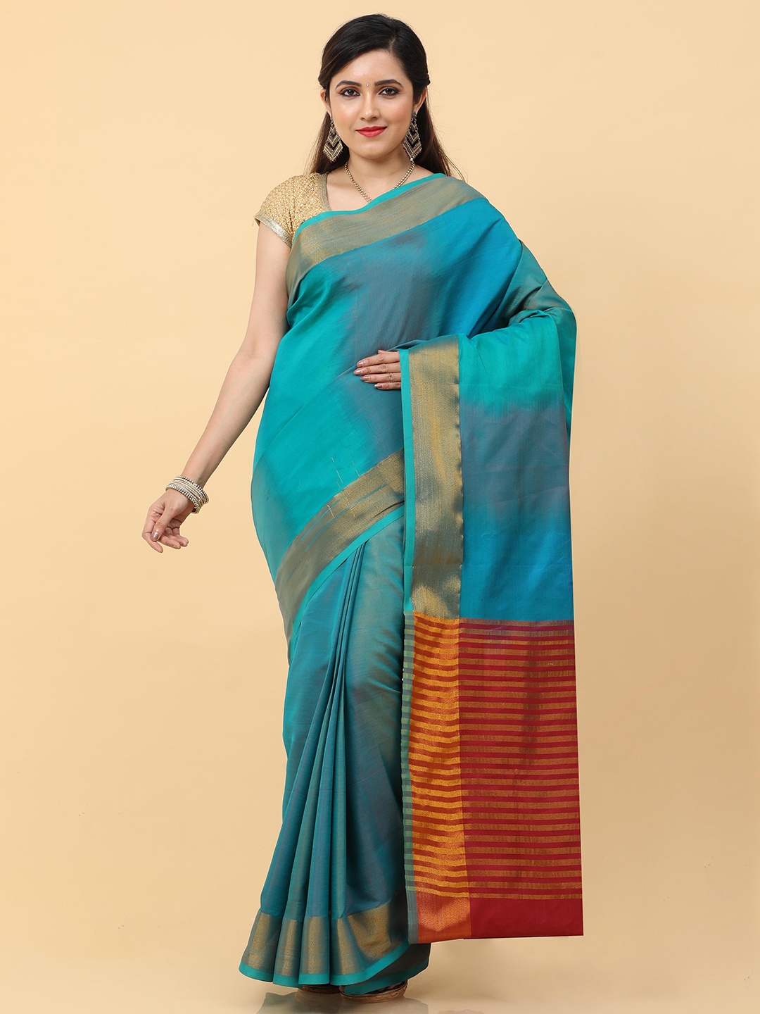 

Kalamandir Blue & Red Zari Pure Silk Ikat Saree