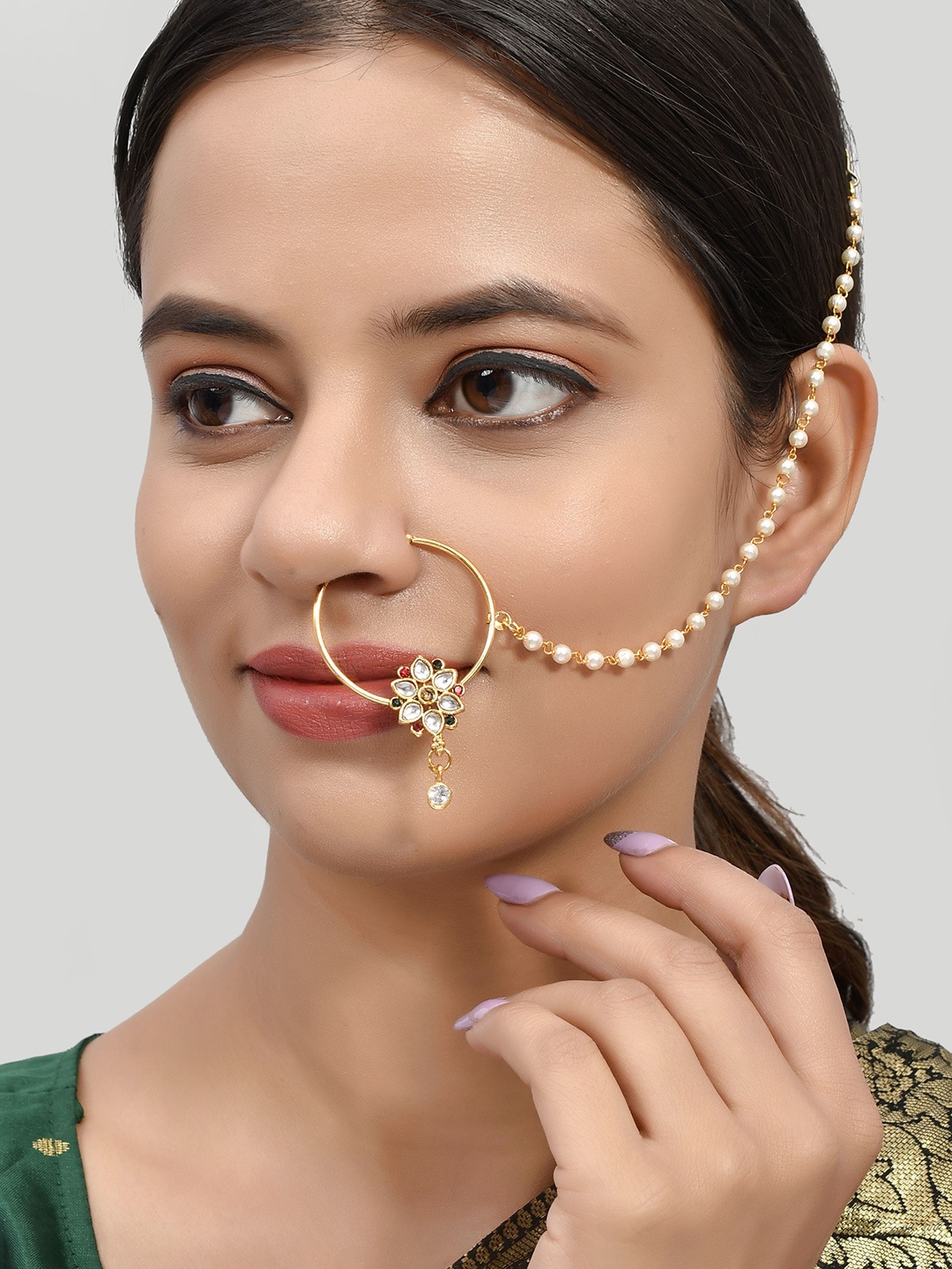 

Silvermerc Designs Gold Plated Red & White Kundan Studded & Beaded Nose Ring