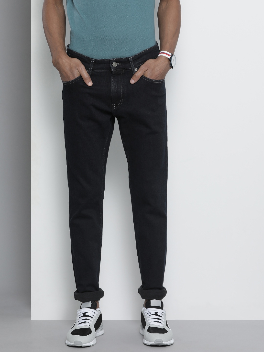 

Tommy Hilfiger Men Blue Mid-Rise Clean Look Slim Fit Stretchable Jeans