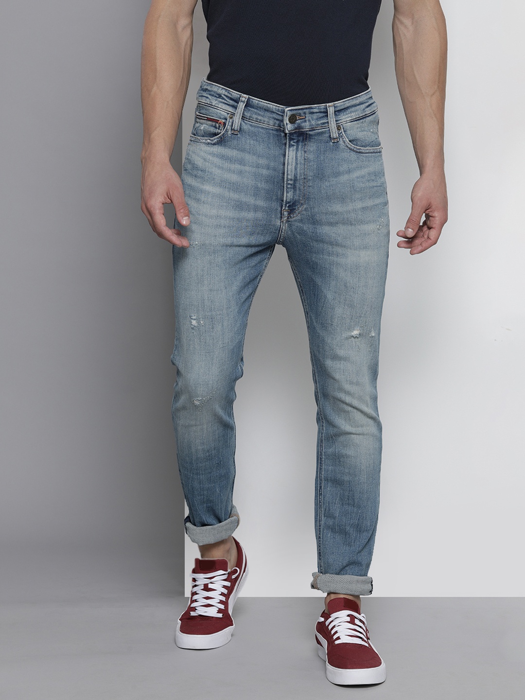 

Tommy Hilfiger Men Blue Skinny Fit Low Distress Light Fade Stretchable Jeans