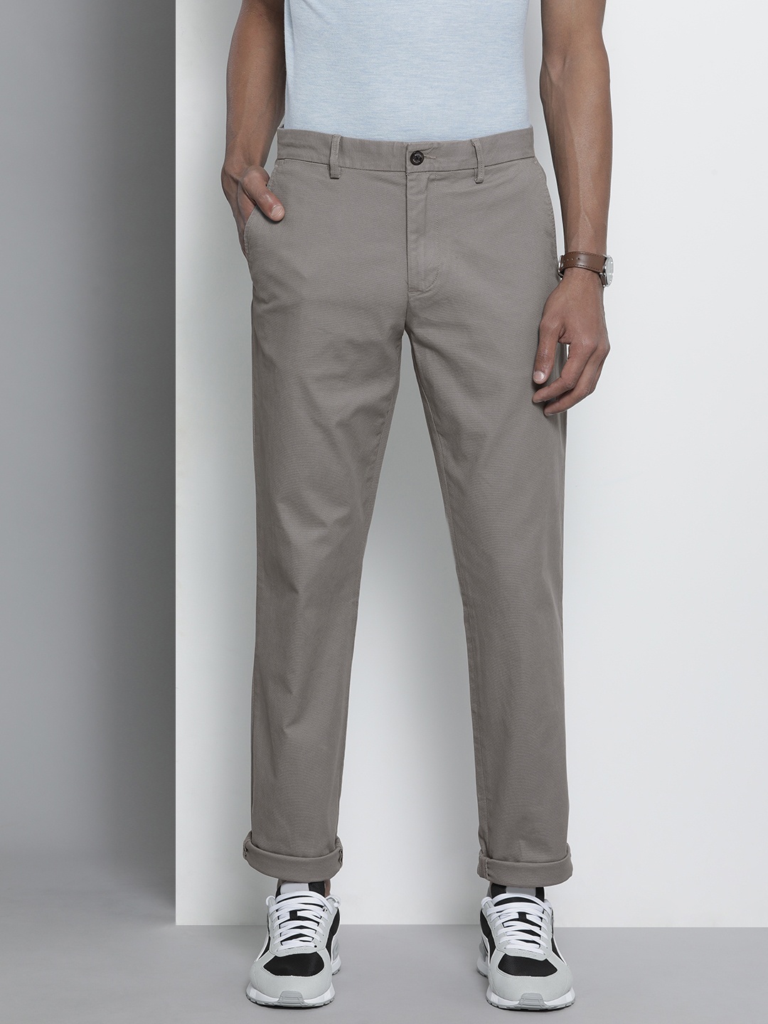 

Tommy Hilfiger Men Grey Solid Regular Trousers