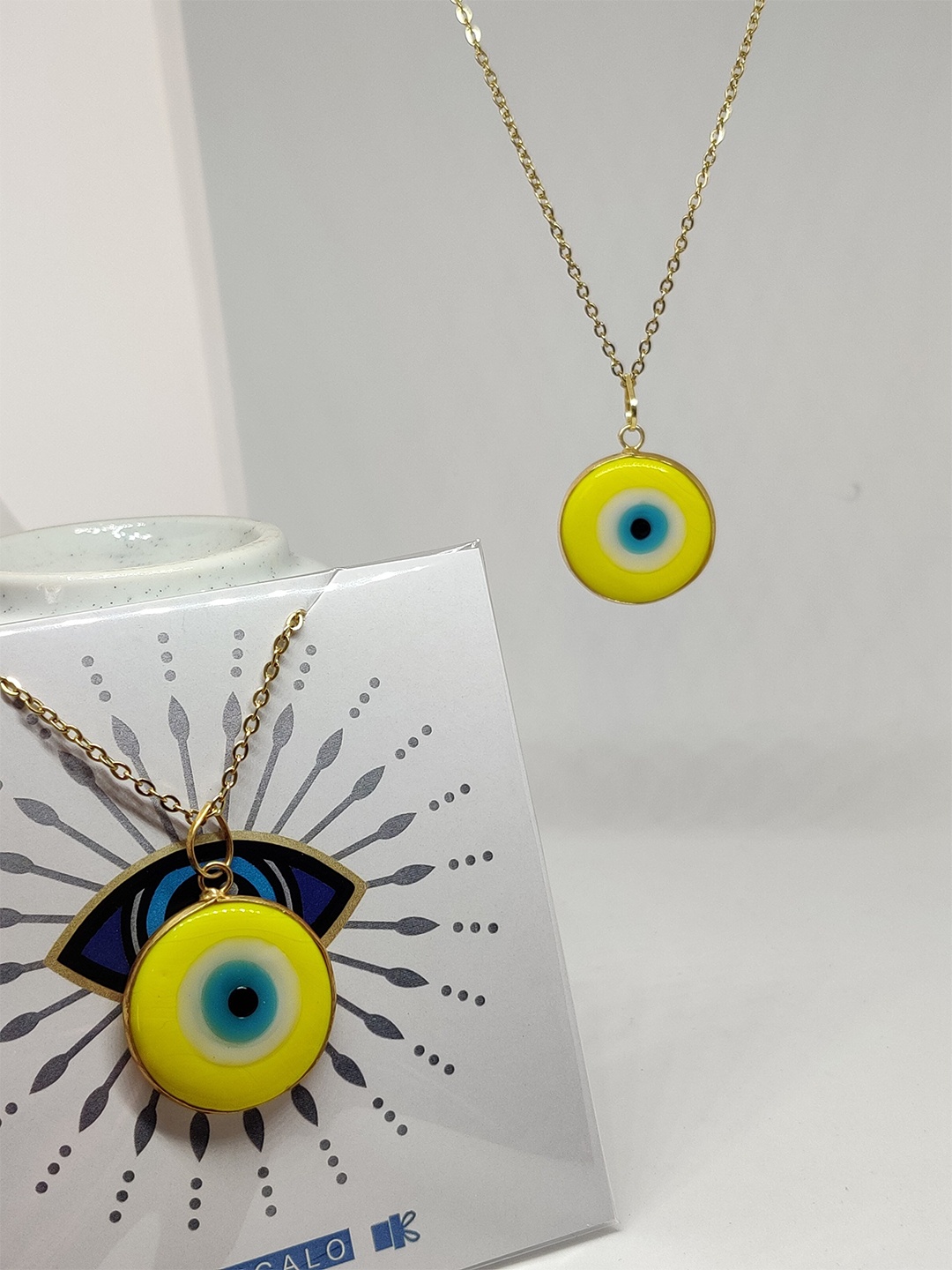 

EL REGALO Yellow & Gold-Toned Evil Eye Tribal Necklace